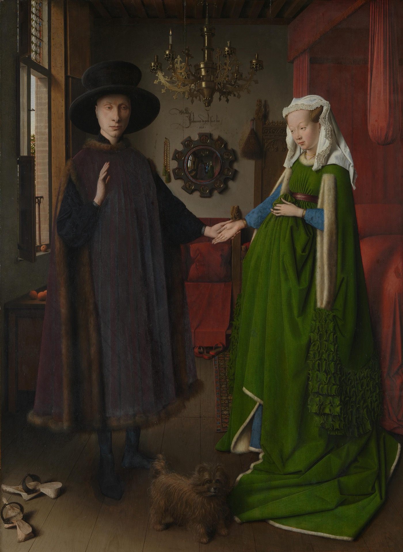 The Arnolfini Portrait by Jan van Eyck, 1434, showing a man and woman holding hands in a furnished room with a convex mirror and brass chandelier behind them.