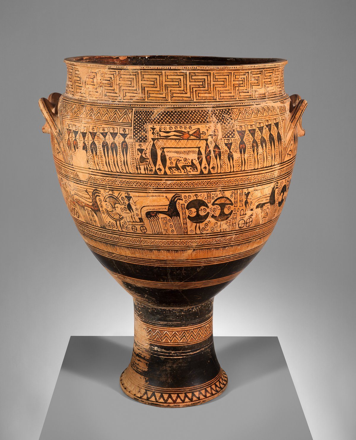The Hirschfeld Krater, a 108-centimeter Late Geometric terracotta funerary vase at the Metropolitan Museum of Art, its surface organized into bands of meander, zigzag, and figural ornament from rim to foot.