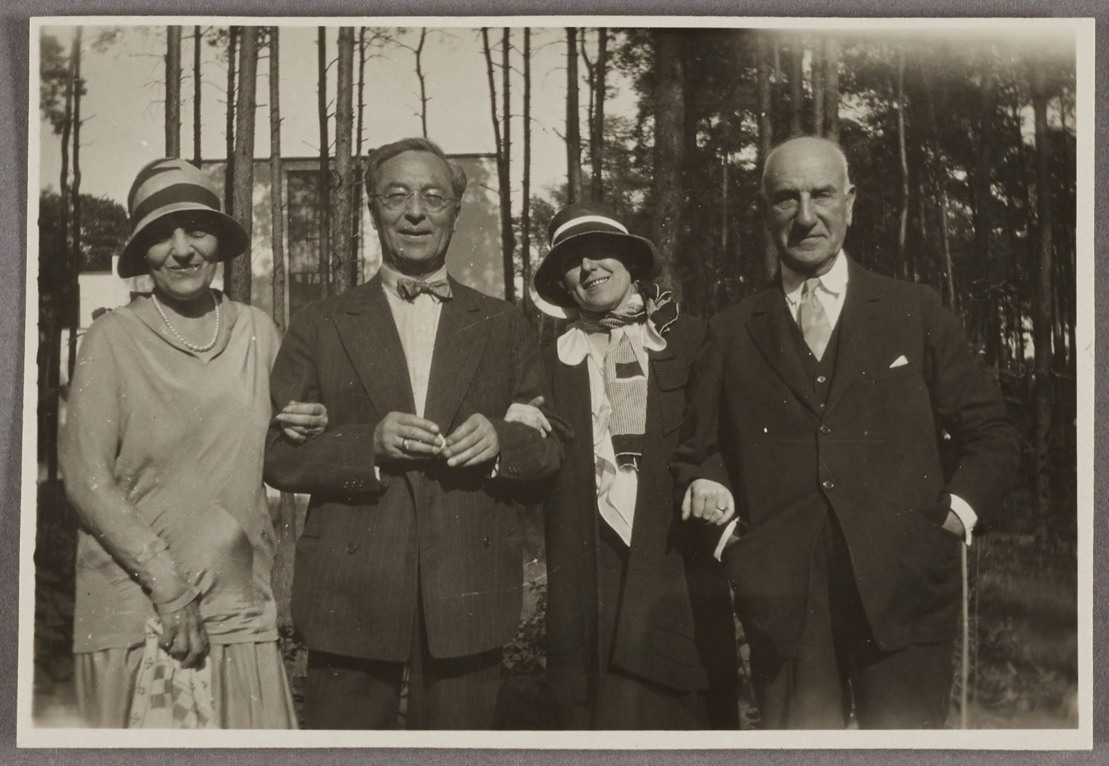Solomon R. Guggenheim, his wife, Hilla von Rebay, and Wassily Kandinsky photographed together in the Bauhaus garden in Dessau in 1929, during the trip that deepened Rebay's push to build Guggenheim a non-objective art collection.